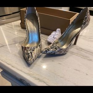 Guess brand snake skin pointy pumps size